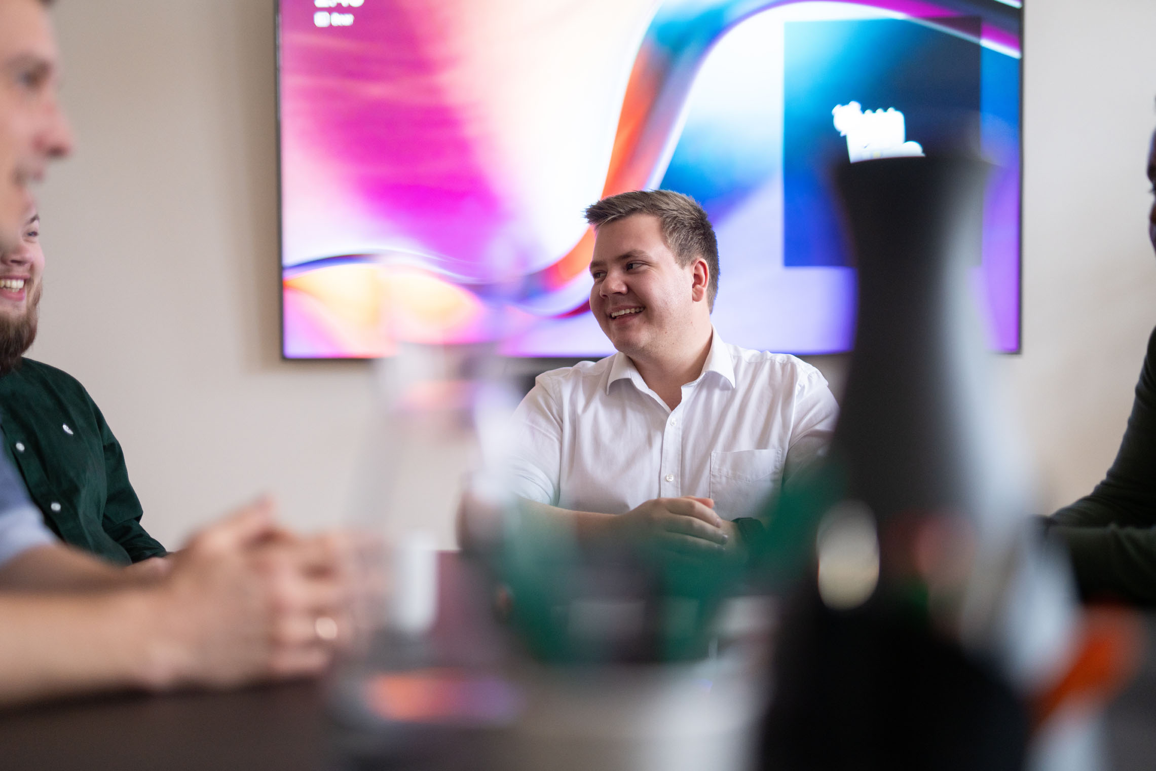 Munu colleagues in a meeting