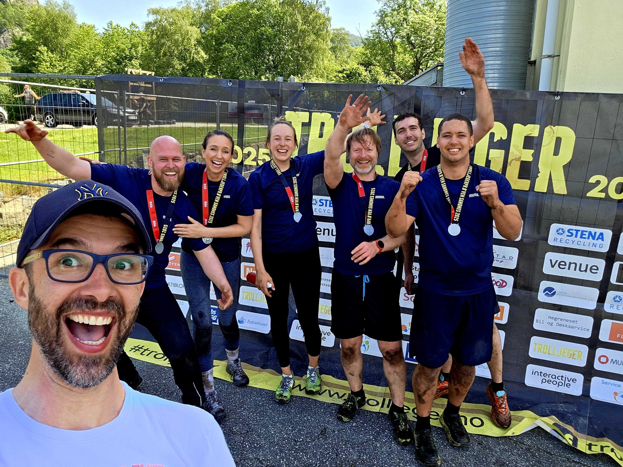 Colleagues with medals after competition